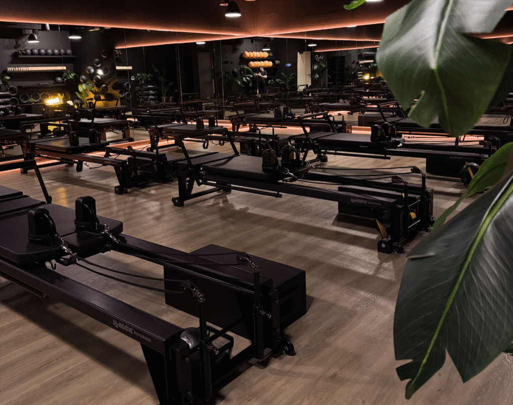 Reformer Pilates machines in a modern studio